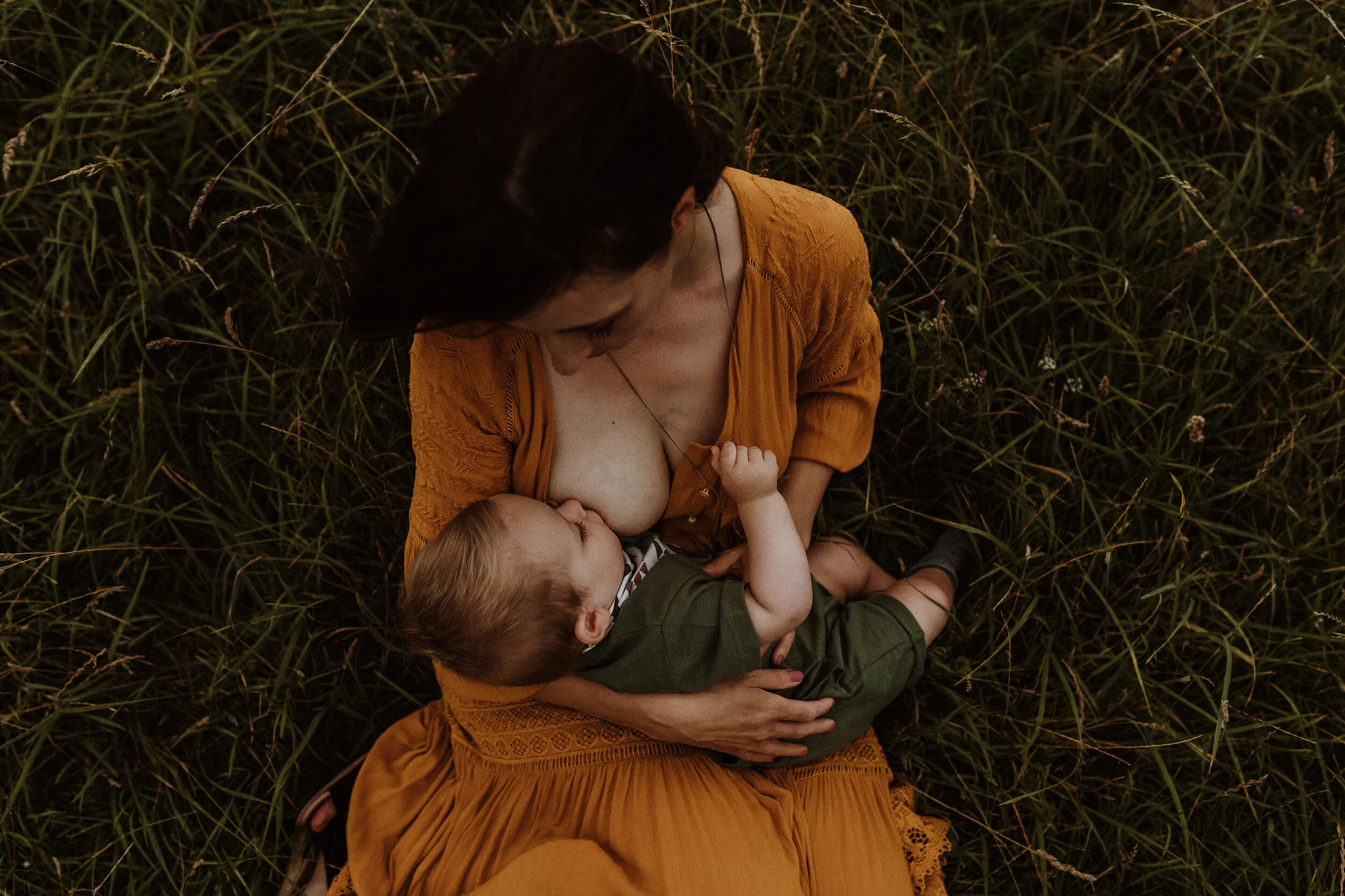 A pregnant woman standing in water